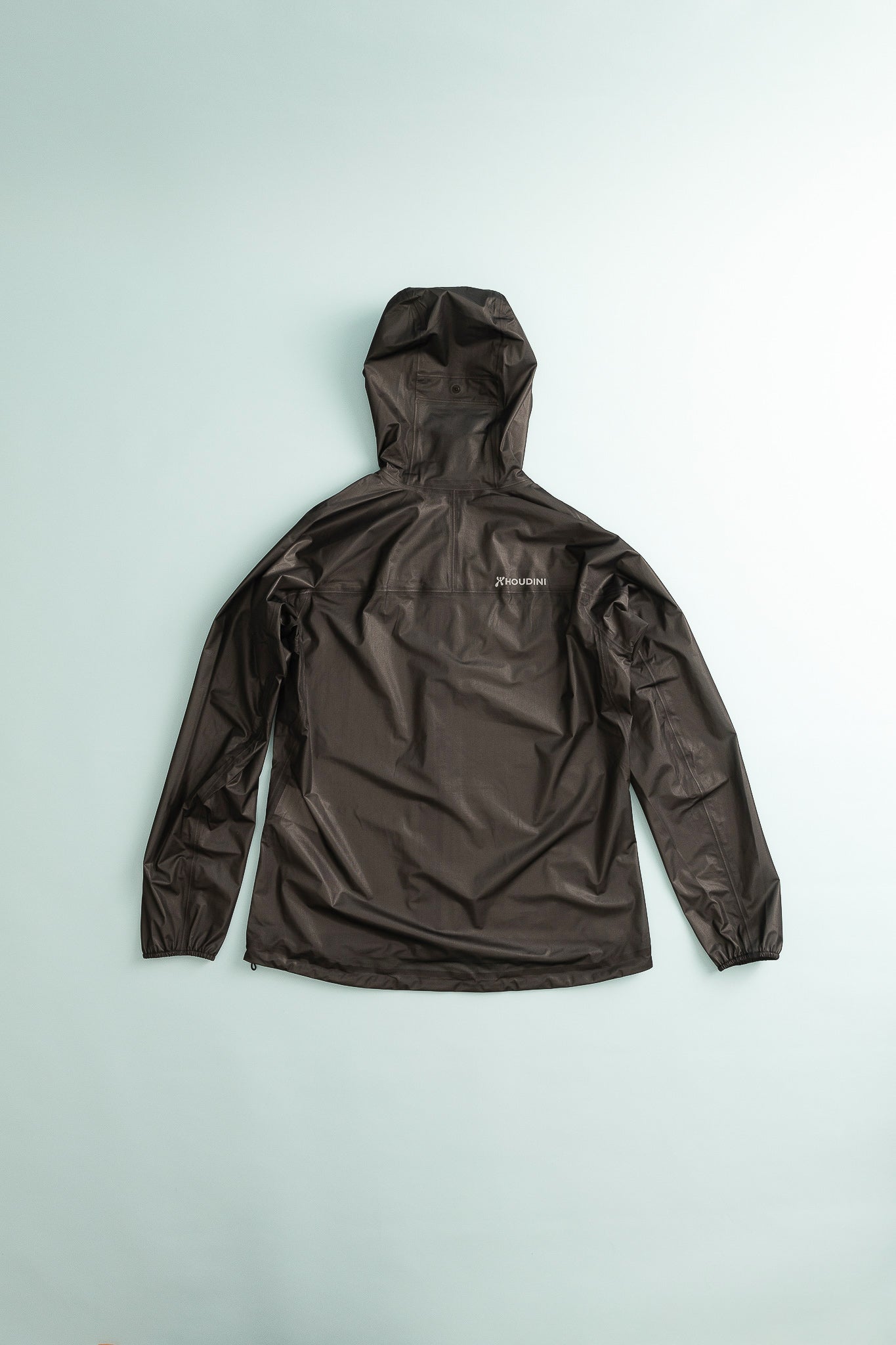 Womens The Orange Jacket - True Black back view showcasing the waterproof design and hood.