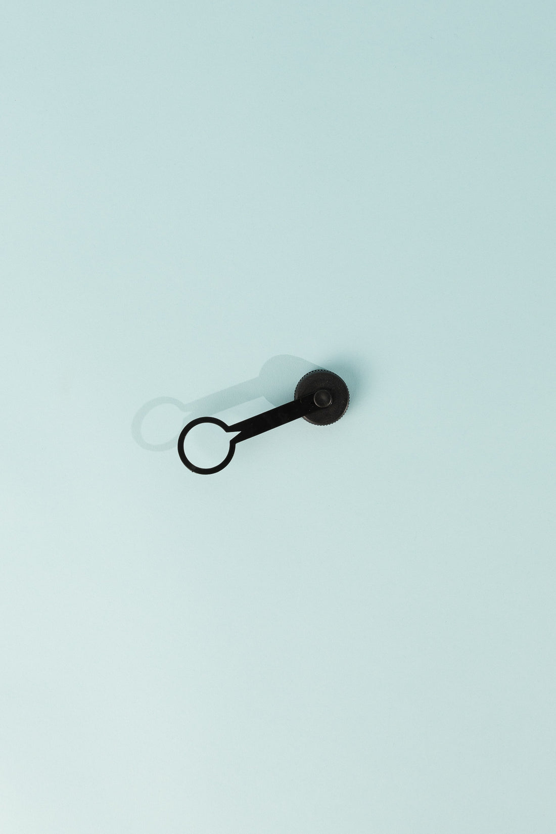 Replacement Tethered Cap for 28mm threaded neck with tether, black color on light background.