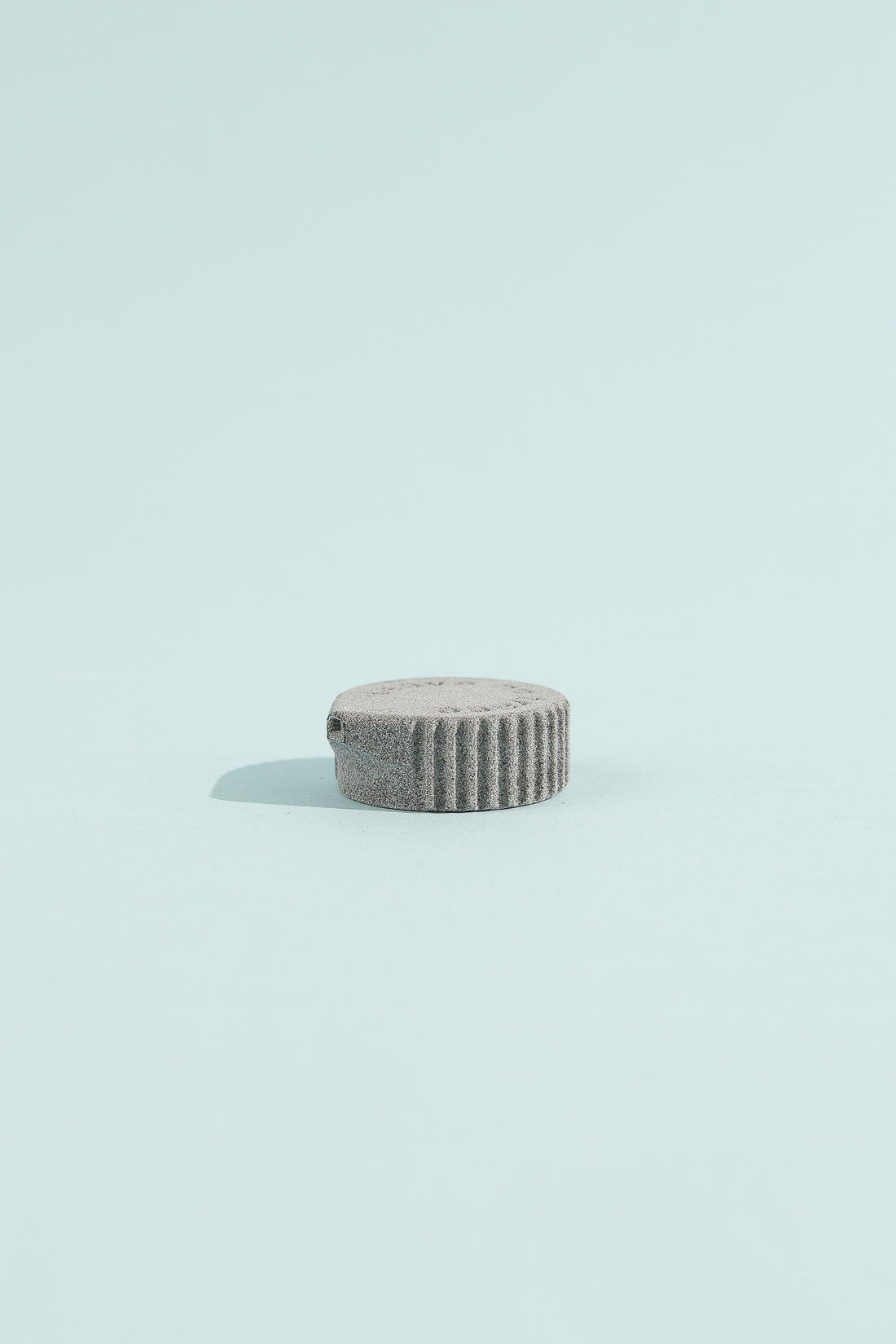 Bottle Cap Bidet - Granite attachment for water bottles, ideal for hikers seeking cleanliness and eco-friendliness.
