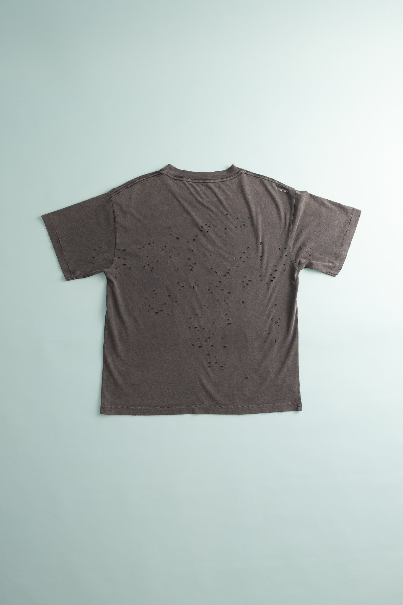Back view of MothTech™ T-Shirt in aged black with ventilation holes for breathability.