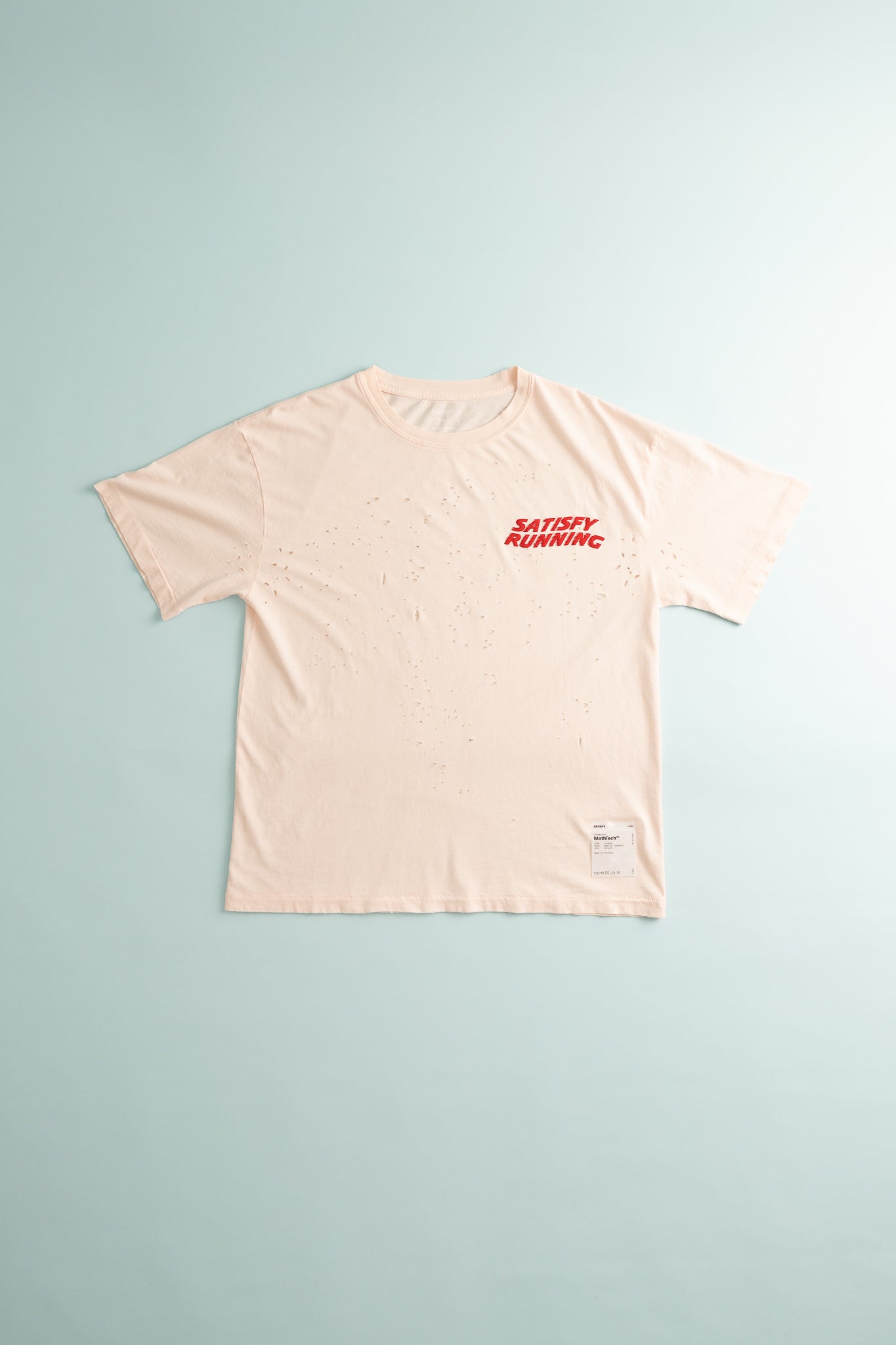 MothTech™ T-Shirt in sun bleached rosewater with ventilation holes, perfect for breathable running.