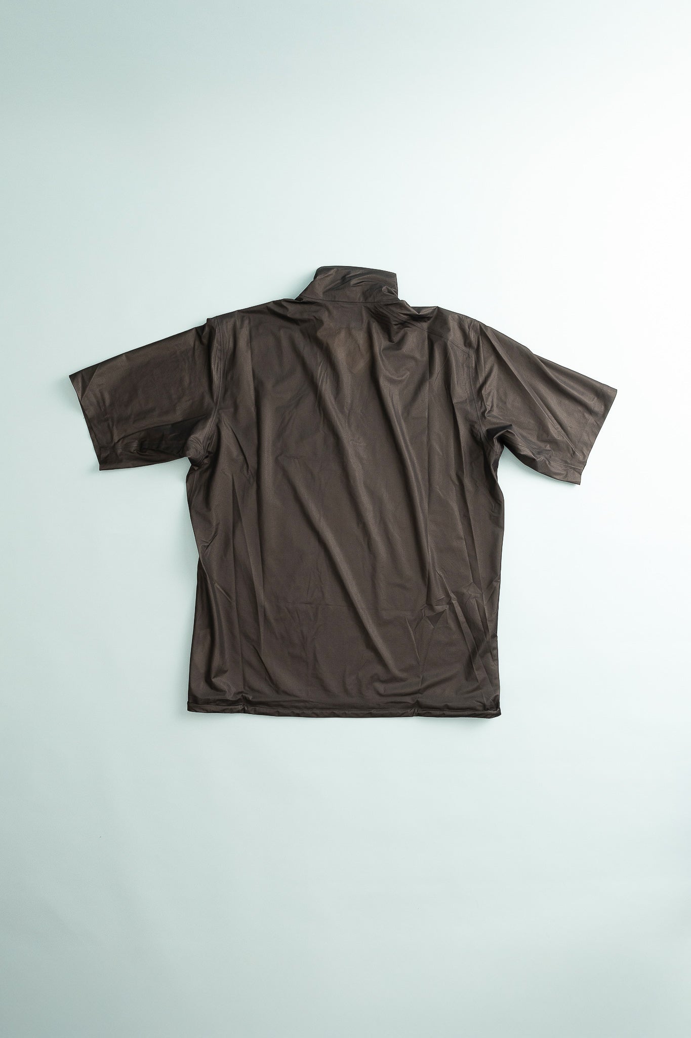 Mens The Orange Tee - True Black back view showing the lightweight and flexible design for outdoor activities.
