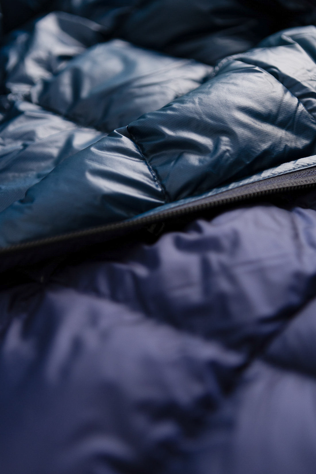 Close-up of the US Men's Superior 800 Down Jacket in navy, showcasing the high-quality down insulation and fabric details.