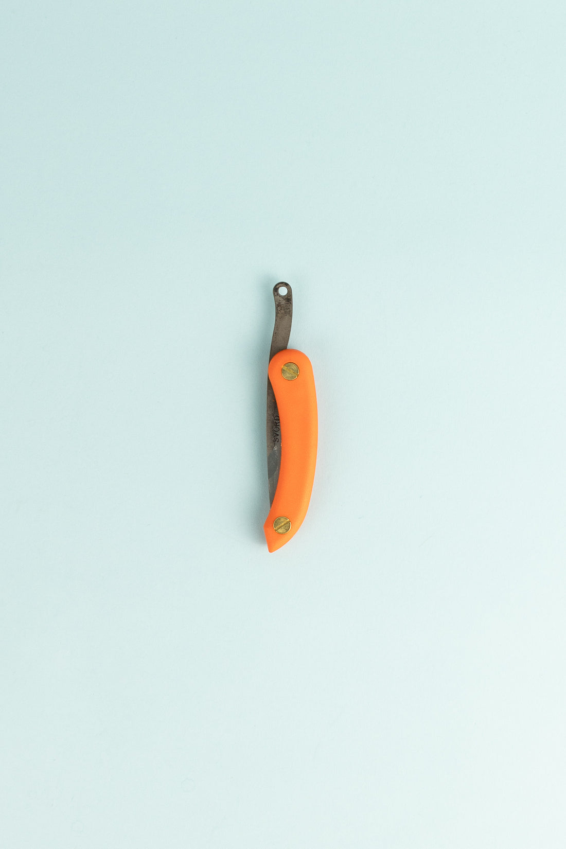Peasant Knife Mini - Orange, handcrafted knife with orange handle and carbon steel blade, showcasing quality craftsmanship.