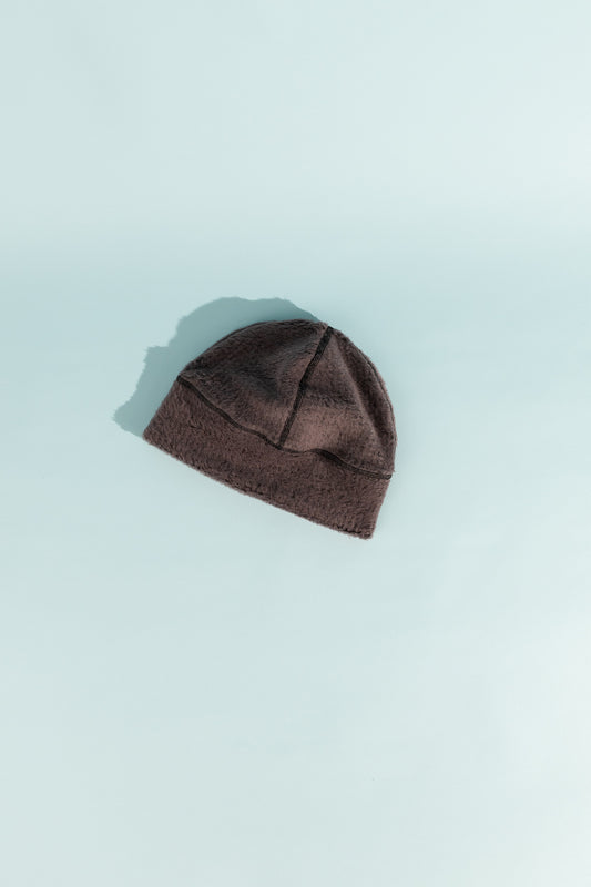 High Loft Wool Beanie in Moonscape and Black color on a light background, showcasing its cozy wool material.
