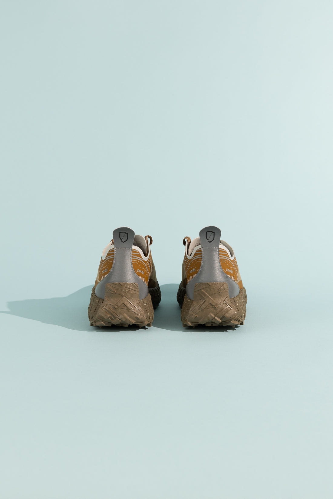 Back view of the Norda 001A - Loam shoes highlighting design and color details.