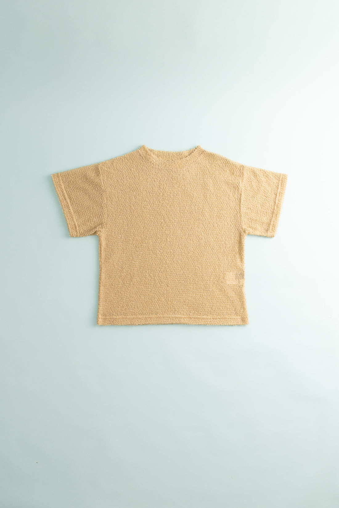 Shag Tee v2.0 in Cornstalk color, view of back, lightweight and compressible hoodie design.