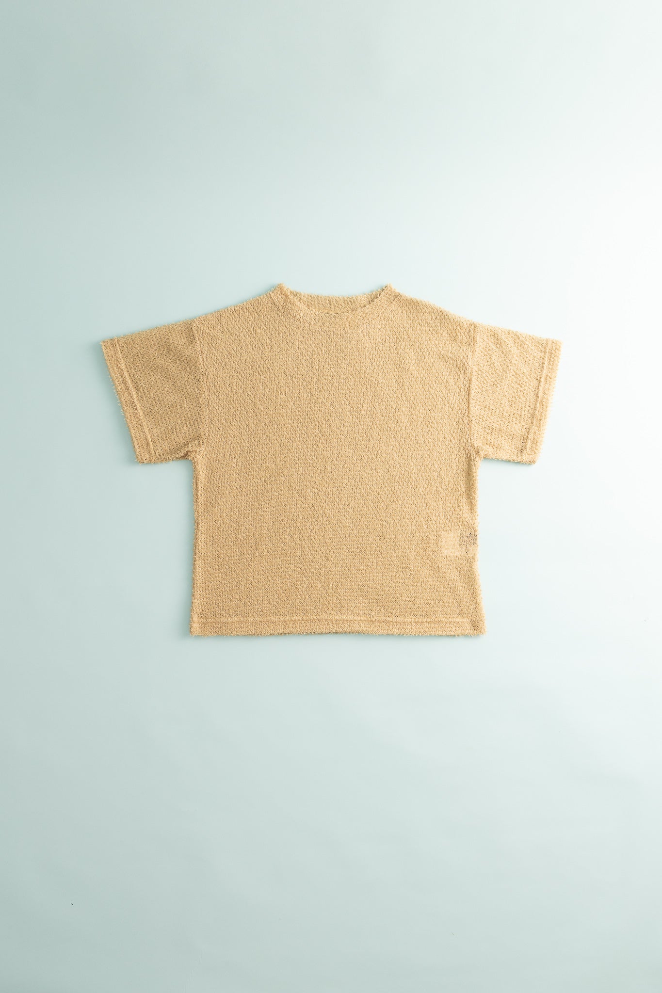 Shag Tee v2.0 in Cornstalk color, view of back, lightweight and compressible hoodie design.