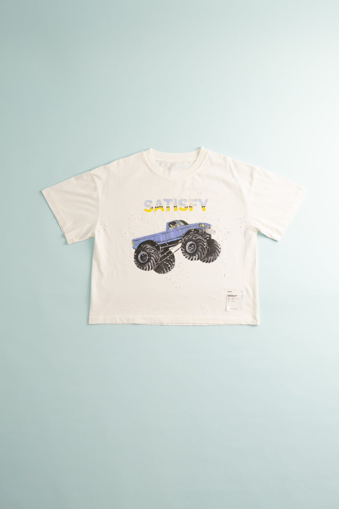 Women's MothTech™ T-Shirt in off-white with monster truck graphic for cool ventilation and comfort.