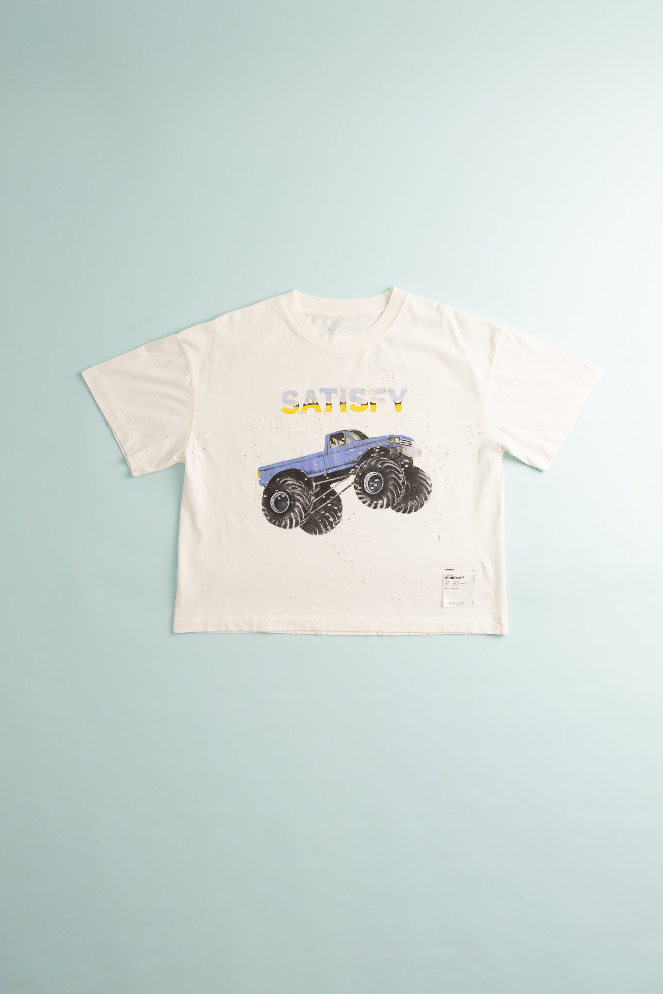 Womens MothTech™ T-Shirt in off-white with monster truck graphic for cool ventilation and comfort.
