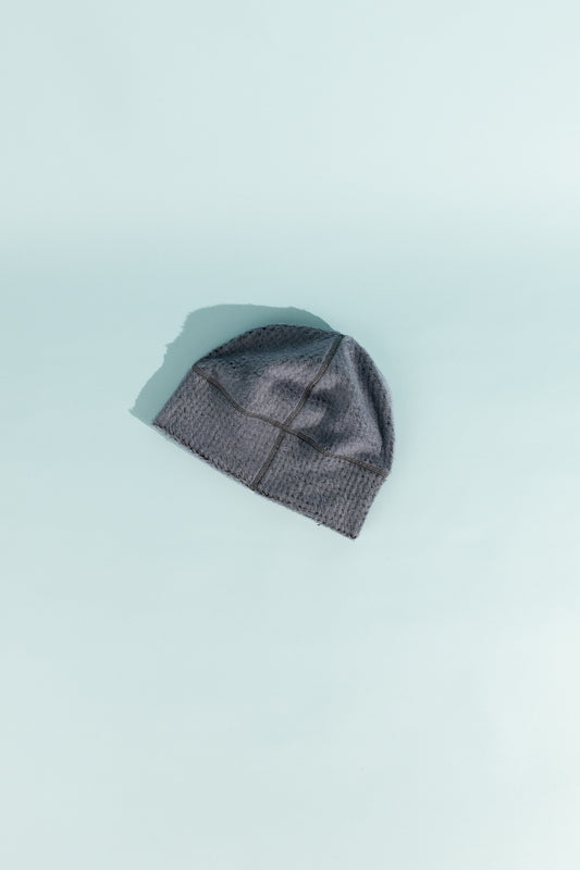 High Loft Wool Beanie in Flintstone color, showcasing its plush texture and stylish design for outdoor activities.
