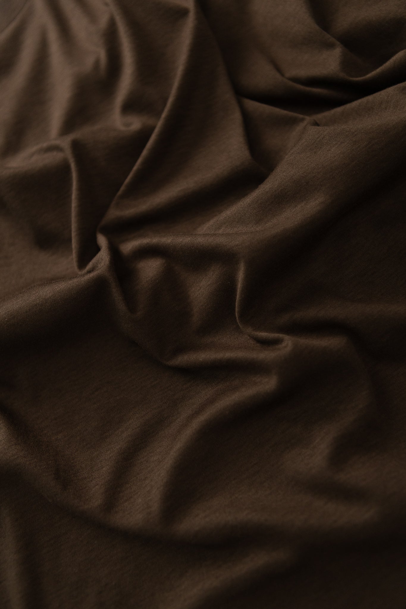 District Vision Dolman Mens Short Sleeve Tee fabric close-up in deep brown color showing soft texture