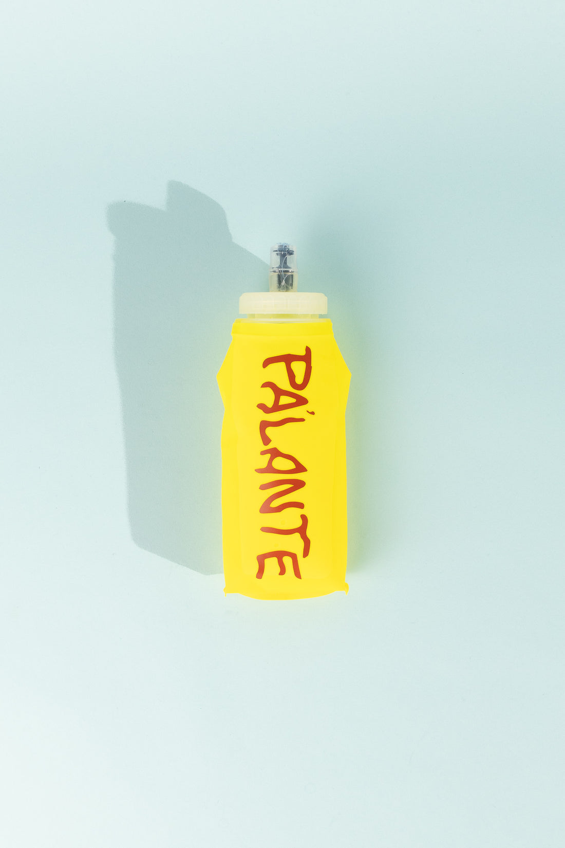 Floppy Water Bottle in yellow color with Pa'lante branding and a wide mouth design.