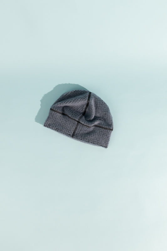 High Loft Wool Beanie in Flintstone and Black, showcasing plush merino wool for warmth and comfort.