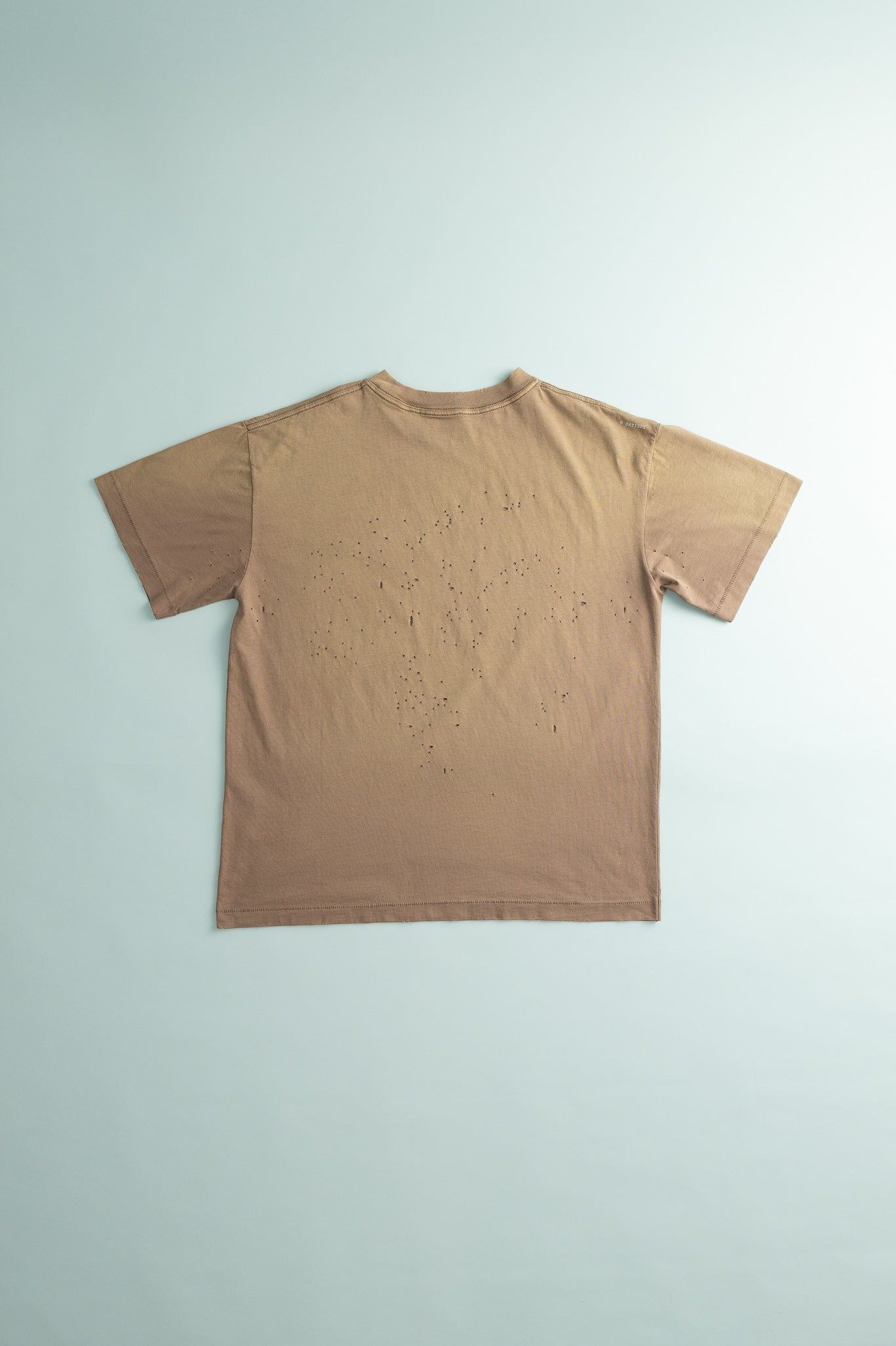 MothTech™ T-Shirt in sun bleached color showcasing ventilation holes on the back for cooling comfort.