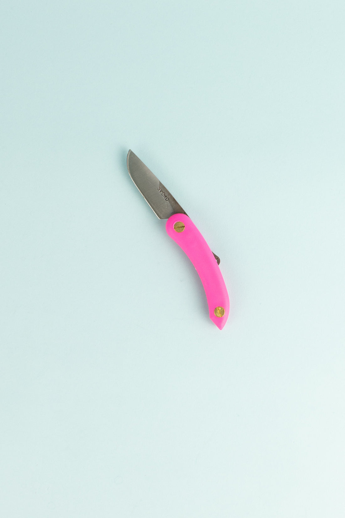 Peasant Knife Mini in pink color, featuring a compact design and high grade carbon blade steel for durability.