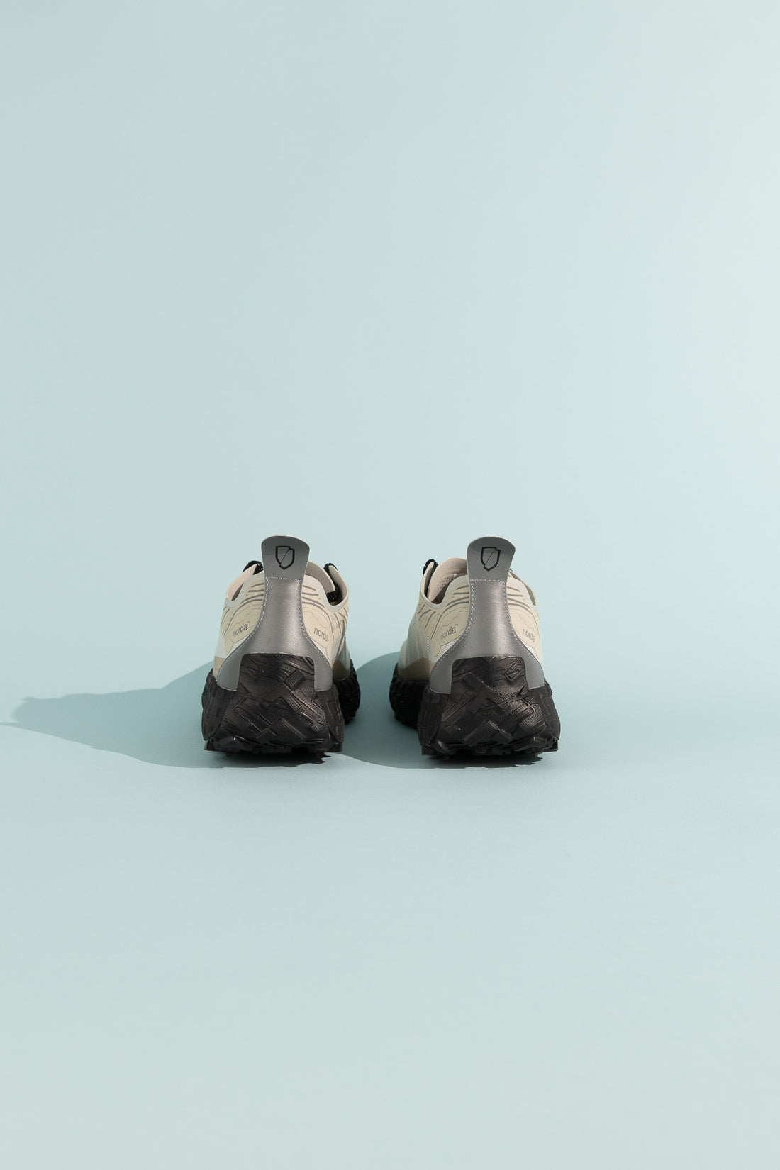 Back view of the Norda 001A - Cinder shoes showcasing sleek design and durable outsole.