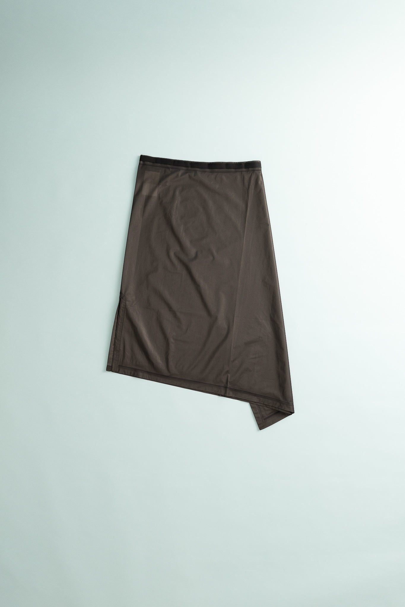 The Orange Square waterproof unisex shell skirt displayed on a light background.