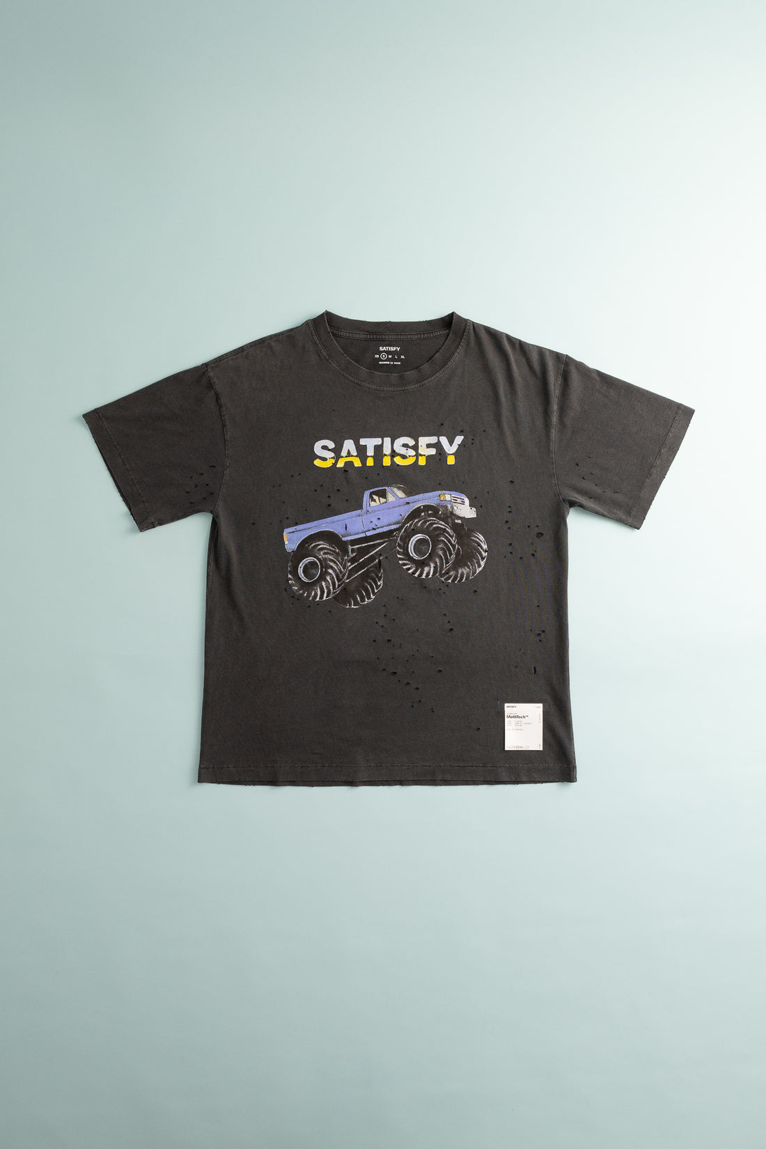 MothTech™ T-Shirt in aged black featuring a monster truck design and ventilation holes for comfort.