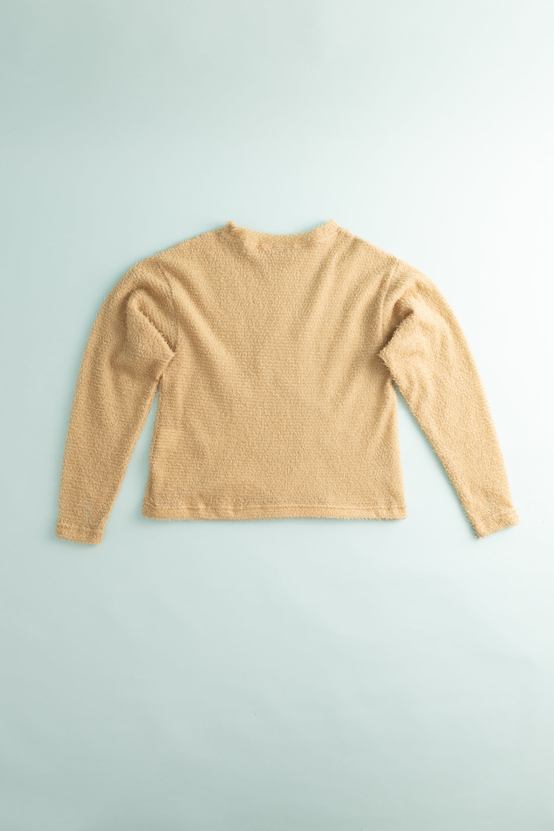Shag Sweater v2.0 - Cornstalk view from the back, featuring a soft and lightweight design, perfect for active insulation.