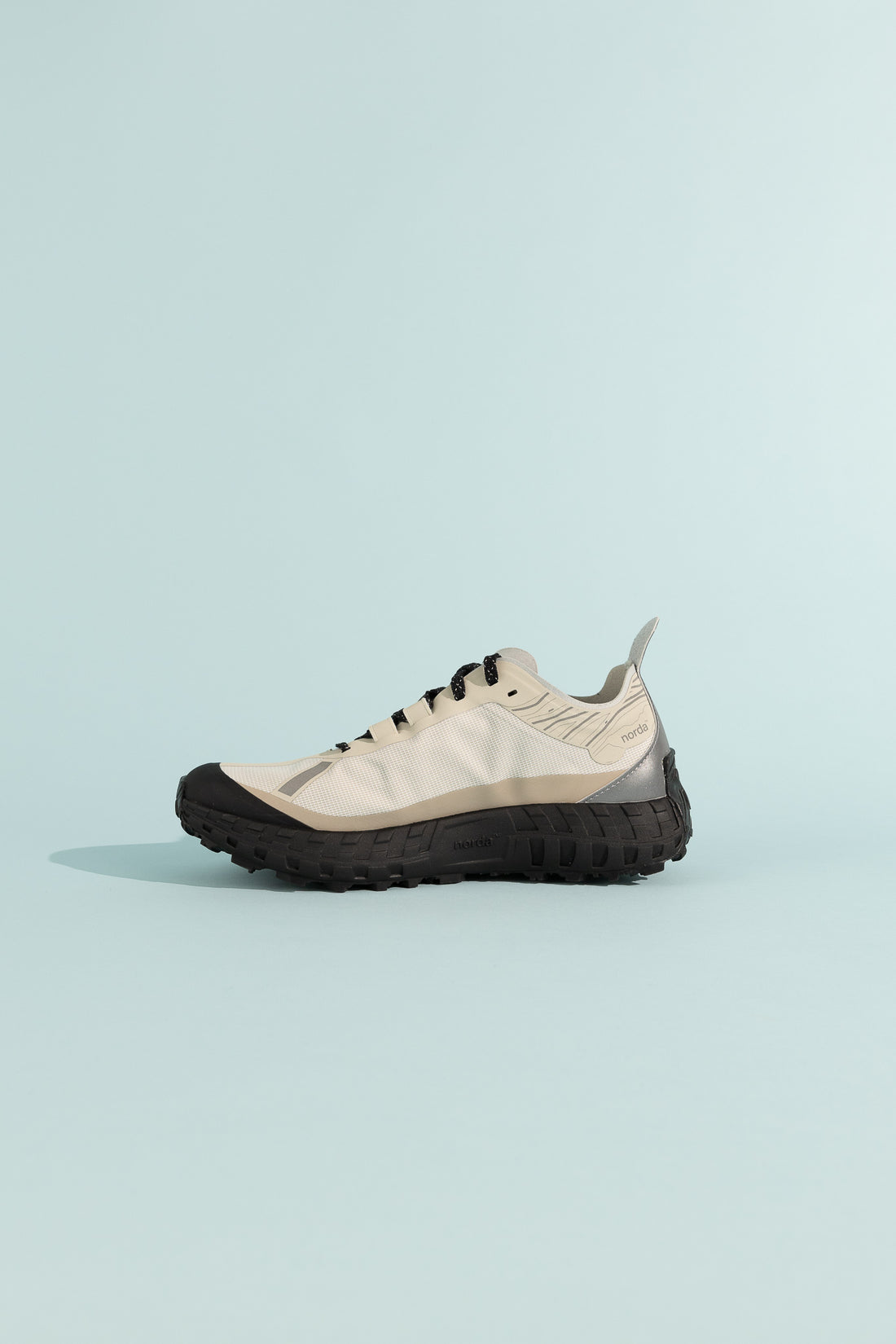 001A - Cinder side view showing the modern design and durable sole for outdoor performance.