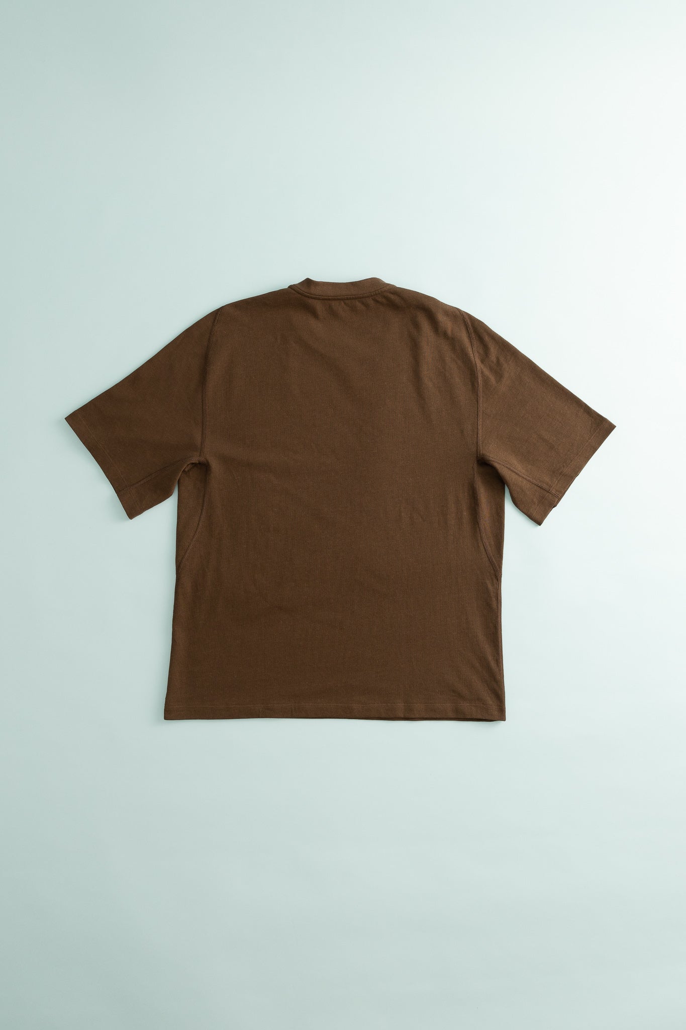 Back view of the Root Hemp Tee in Slate Black, showcasing its comfortable fit and organic fabric blend.