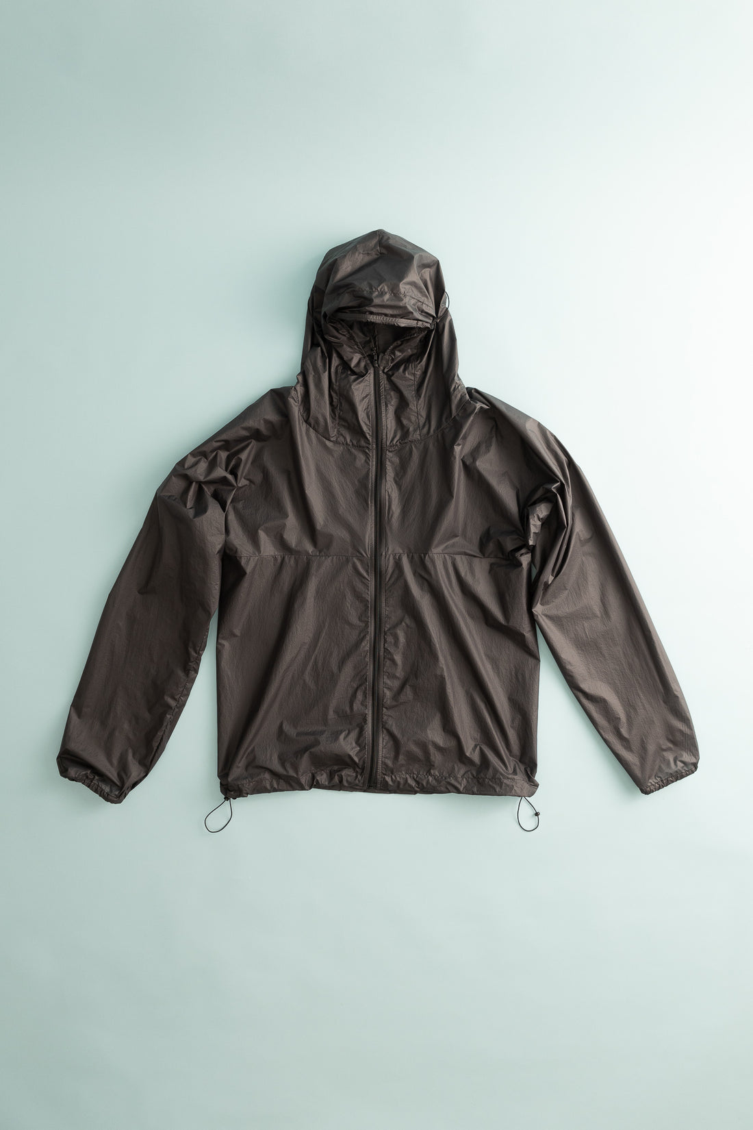 Breaker Wind Shirt in pavement color, lightweight and packable for active protection against the elements.